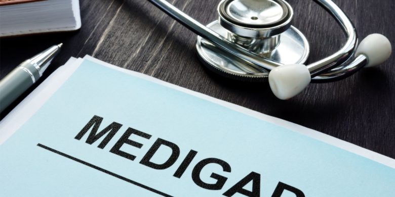 Medigap, also known as medicare supplemental plan in folder next to stethoscope